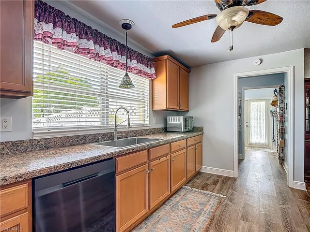 Open door leads to large walk-in pantry, then through to laundry room and out to back yard....