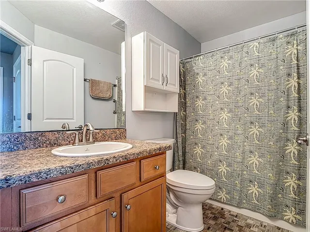 Guest Bathroom with combination tub & shower.