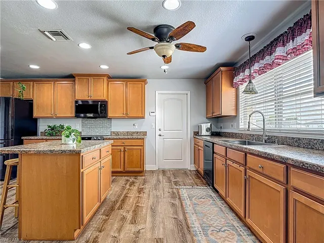 Plenty of kitchen cabinetry for storage