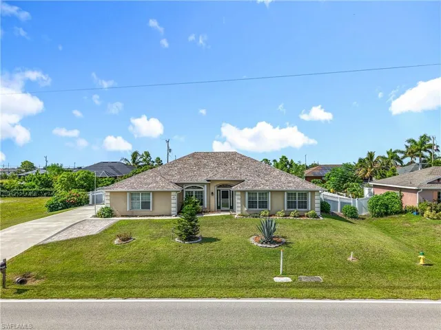 Welcome to your new home with side load garage on oversized triple lot.