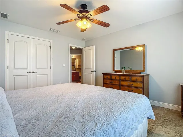 Guest bedroom with large double closet