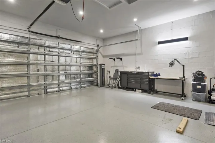 Generator, mini-split AC unit, insulation, and epoxy floor.