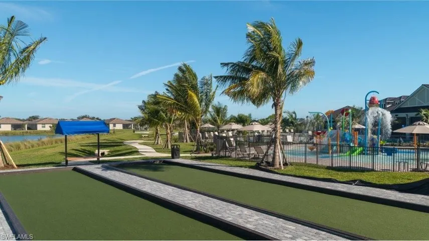 Surrounding community with a residential view and a bocce ball area