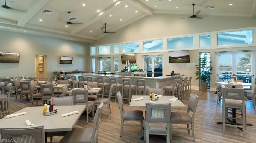 Dining area with wood finished floors, recessed lighting, and a ceiling fan