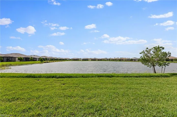 Water view with nearby suburban area
