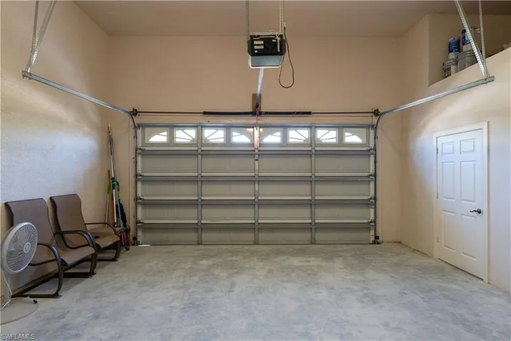 Double and Single Garages with Attic Alcove Storage!