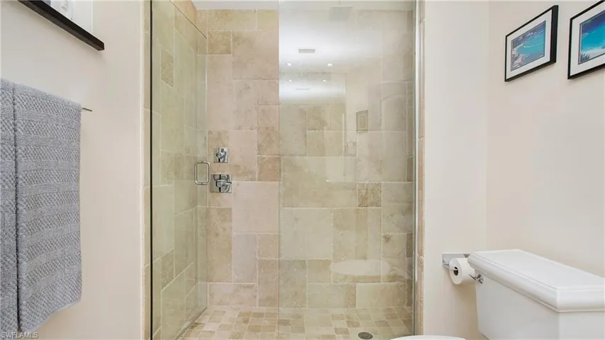 Primary Bathroom featuring oversized stall shower with 2 shower heads