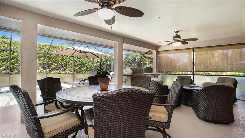 Covered Patio with a wealth of natural light and ceiling fans