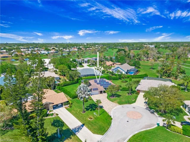 Aerial view of the home and property