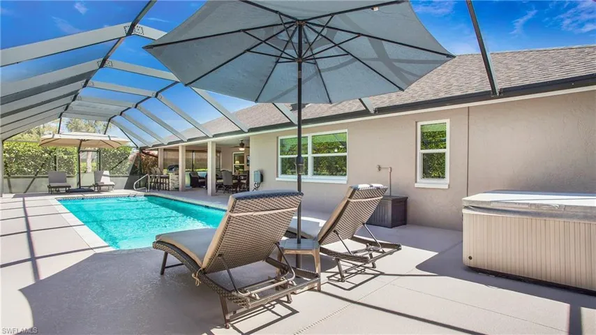 Pool/patio area and a spa/hot tub