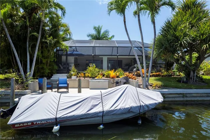 View of dock featuring a lanai
