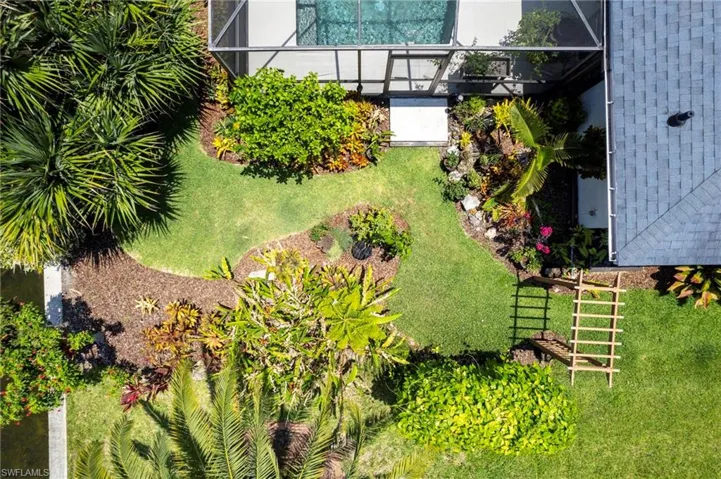 View of yard featuring a lanai