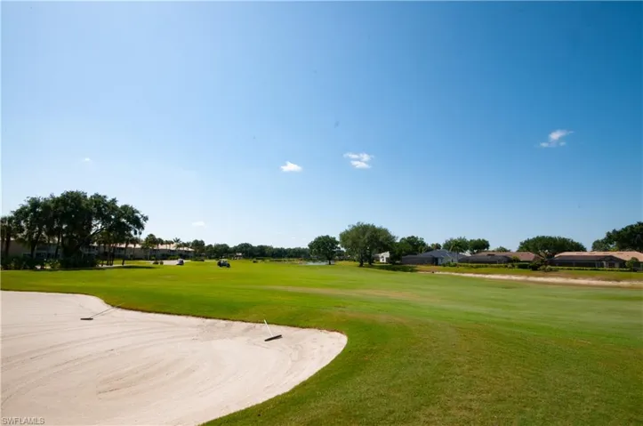 Surrounding community with golf course view of 10 fairway