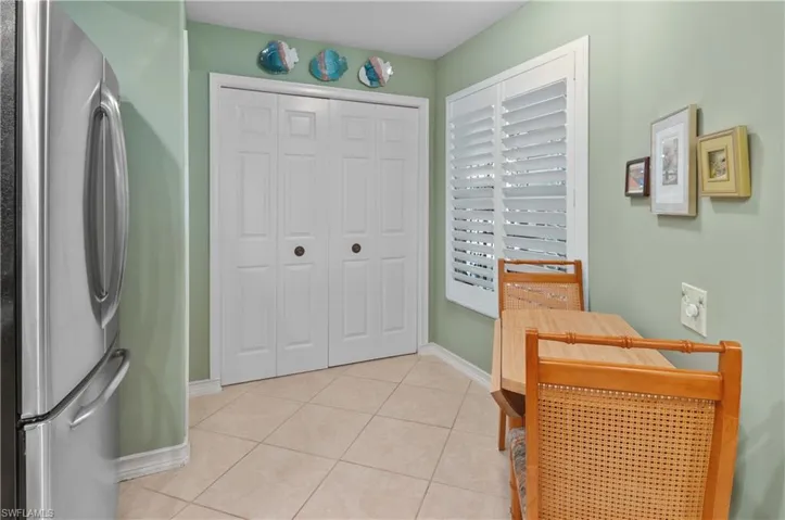 Breakfast area and easy access to washer and dryer behind closet doors
