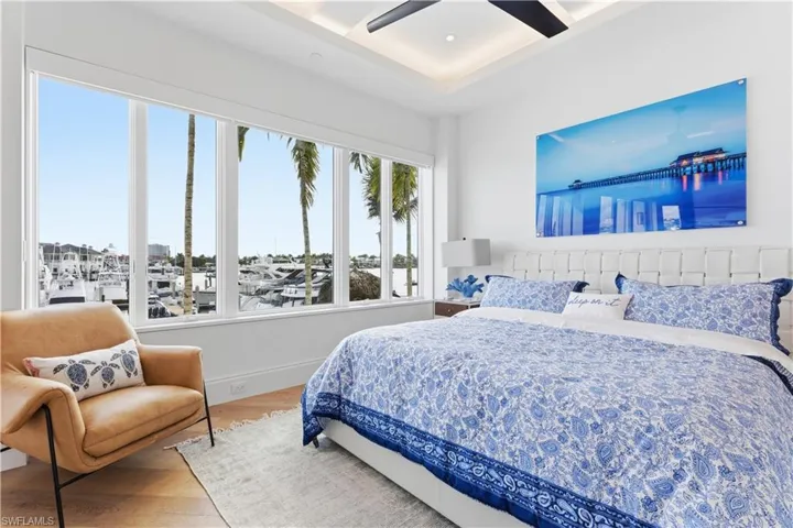 Bedroom featuring wood finished floors and ceiling fan