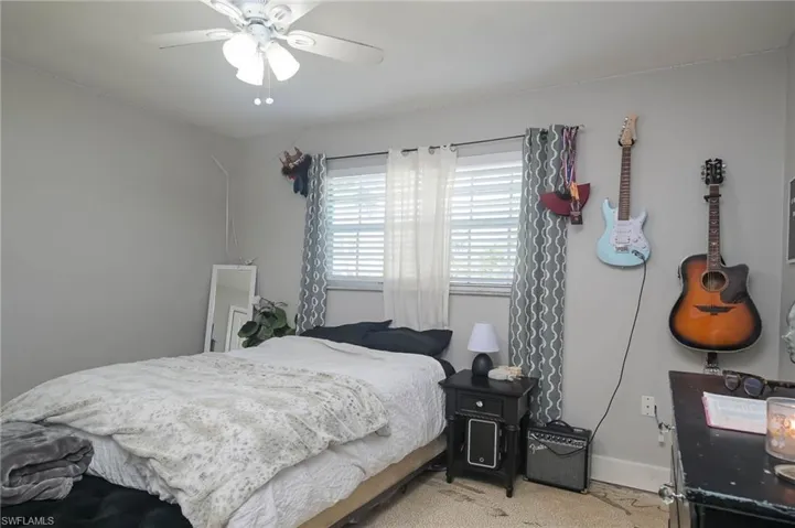 Bedroom with carpet floors and ceiling fan