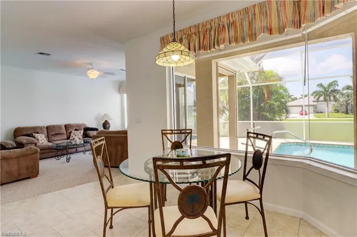 Dining space with ceiling fan