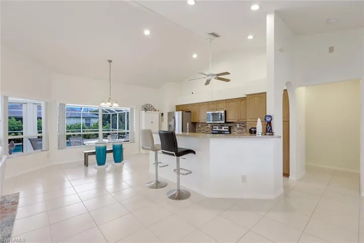 Kitchen peninsula for additional seating.