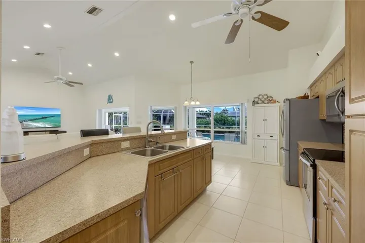 Kitchen opens up to great room, allowing you to freely entertain guests.