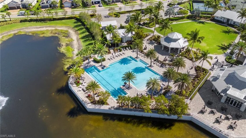Community pool with lap lanes, hot tub, fire pit and cabana bar