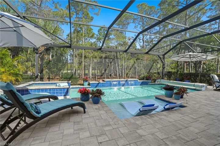 Picture window view and custom fountain delight the senses!