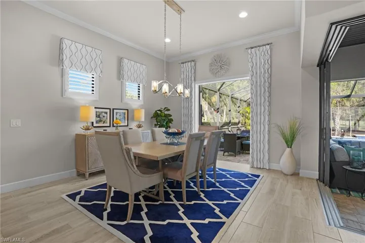 Cafe with French doors to the lanai and zero-corner door
