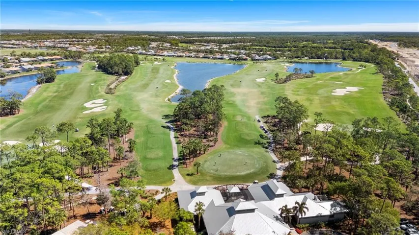 Aerial view of the golf course with Greyhawk homes in the distance