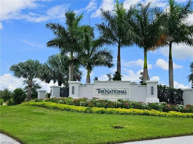 Community sign featuring a yard