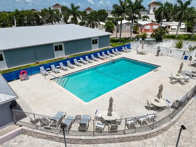 Community pool featuring a patio area