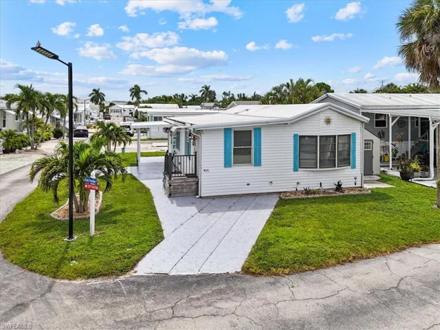 View of front of house with a front lawn