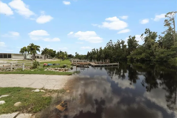 Water view with a dock