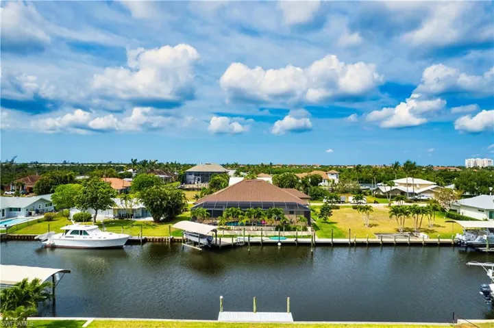 Water view featuring nearby suburban area