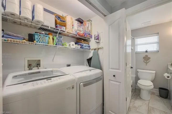 Laundry area with separate washer and dryer