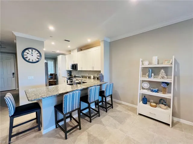9393  Pocida  CT, Naples, FL 34119