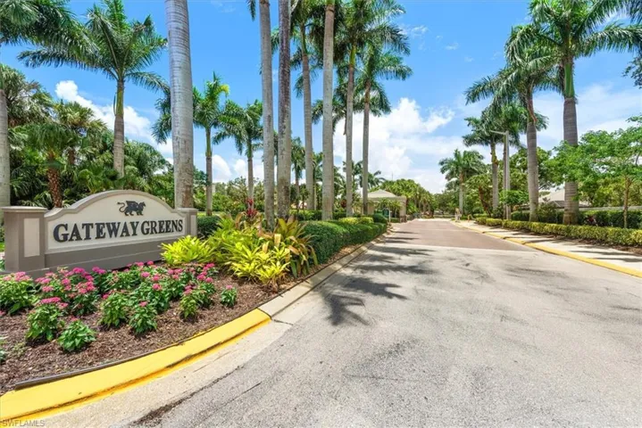 View of asphalt road with curbs