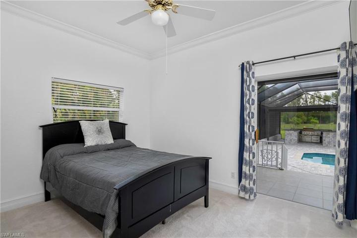 First floor guest bedroom with pool access