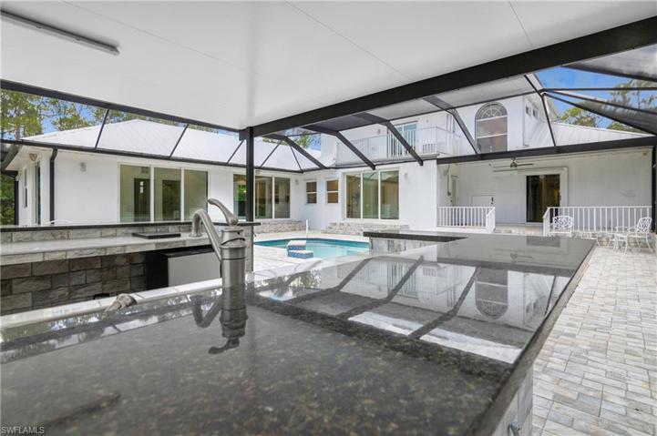 Entertain friends and family in outdoor kitchen area