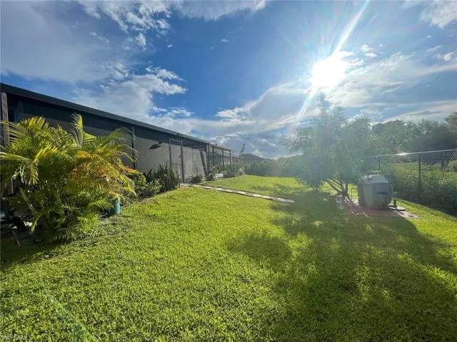 View of yard featuring a storage shed