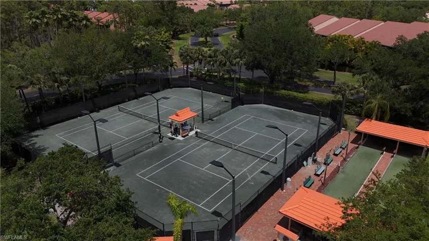 View of tennis court with fence