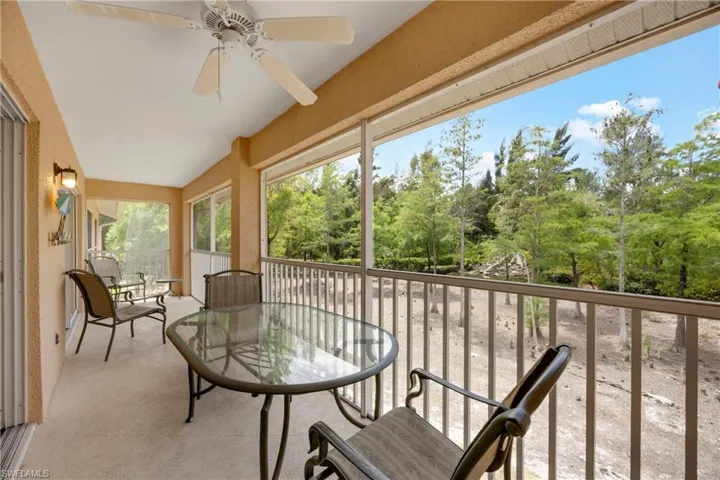 Sunroom with a ceiling fan