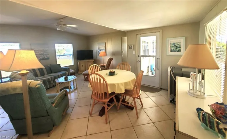 View of the dining and living areas to the front entry.
