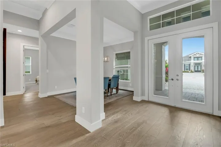 Foyer featuring french doors and abundant amount of natural light