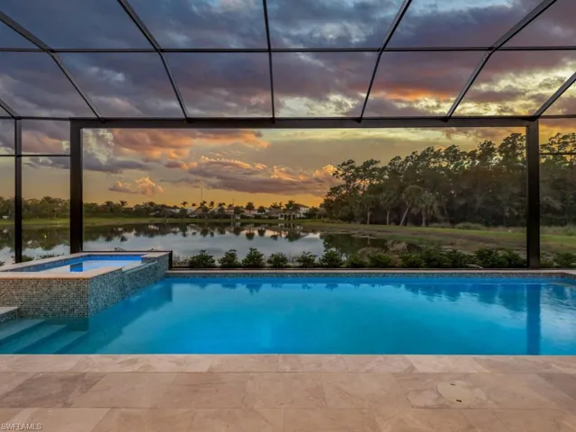 Amazing salt water pool with panoramic views of the lake and lush preserve.