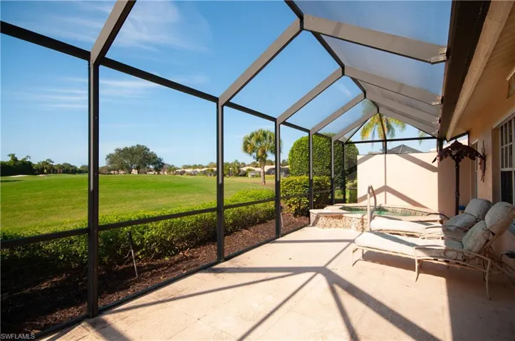 Screened in Lanai with beautiful view of 17th green and lake