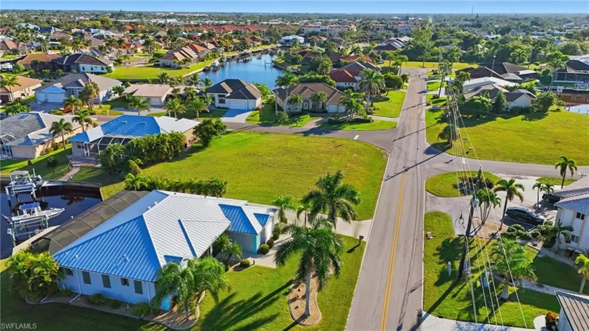Aerial view of residential area with a nearby body of water