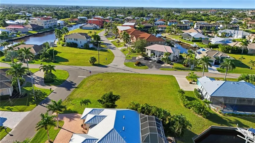 Aerial view of residential area with a large body of water