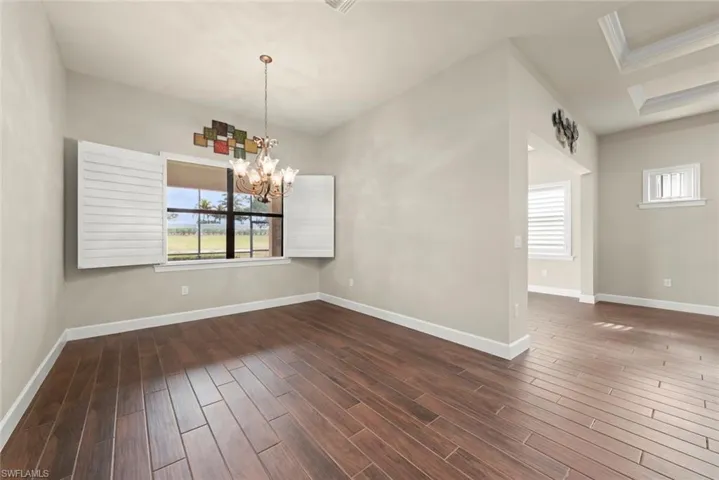 Dining room featuring hanging lights and Tile finished floors