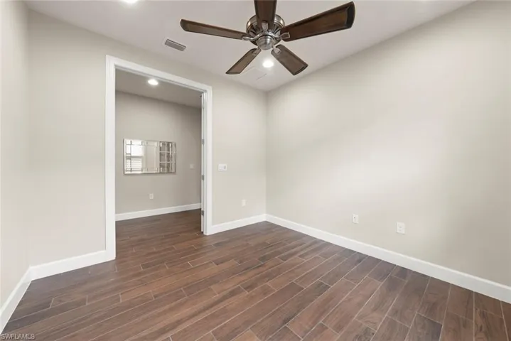 Office with tile  finish floors, ceiling fan, and recessed lighting