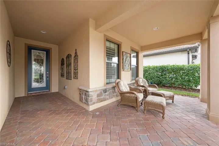 View of front paved covered patio