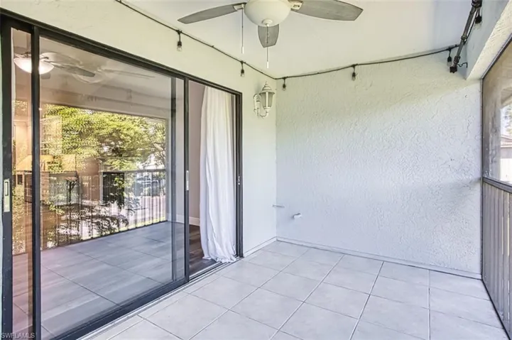 Balcony featuring ceiling fan